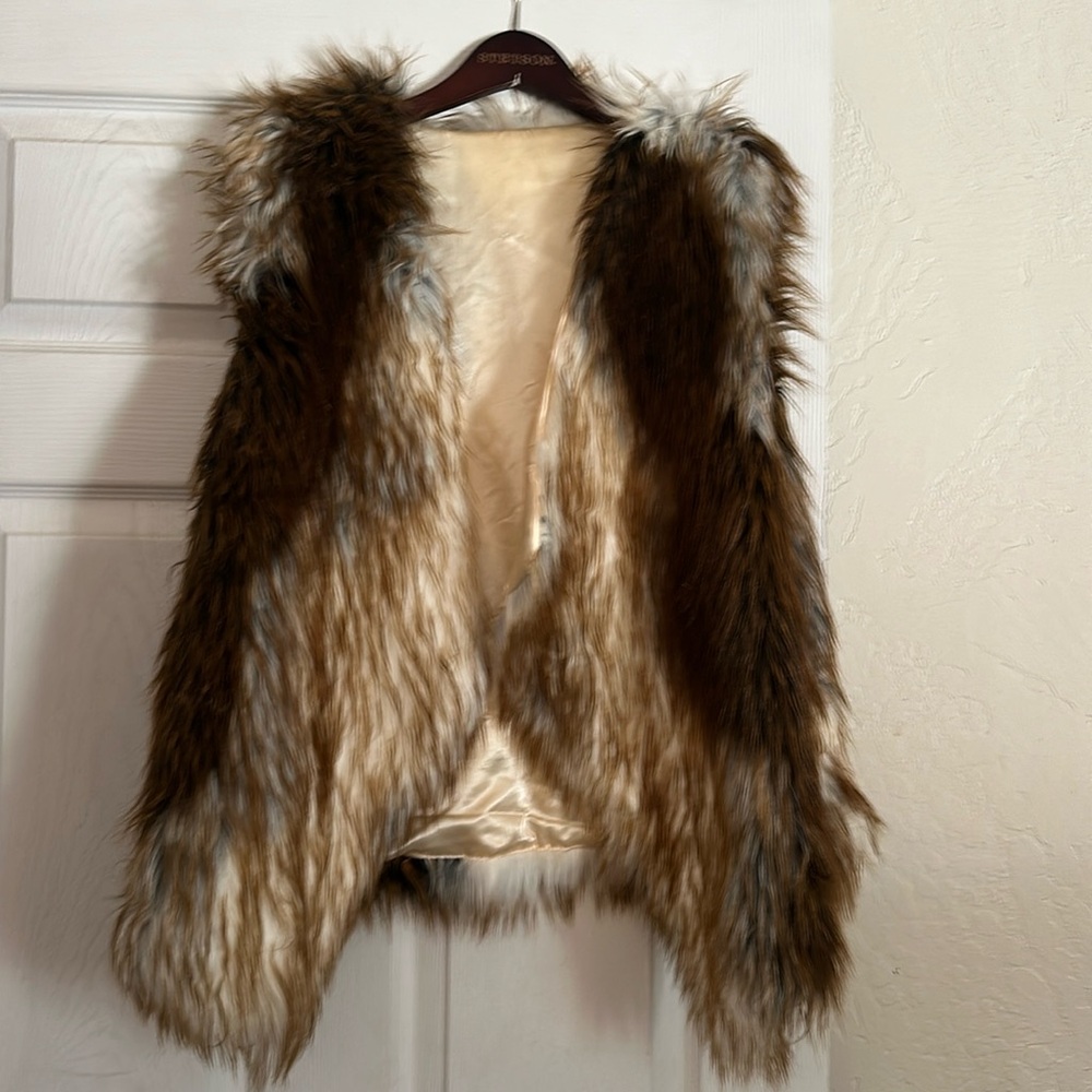 Faux fur vest, satin lined